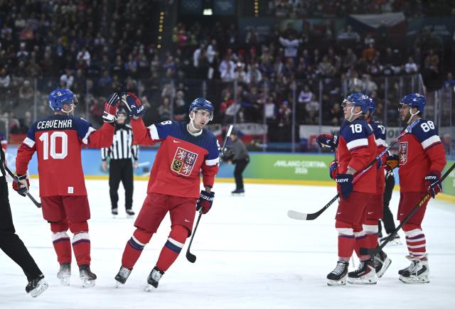 (260217) -- MILAN, Feb. 17, 2026 (Xinhua) -- Martin Necas (2nd L) of the Czech Republic celebrates scoring during the ice hockey men's qualification play-off match between the Czech Republic and Denmark at the Milan-Cortina 2026 Olympic Winter Games in Milan, Italy, Feb. 17, 2026. (Xinhua/Zhang Haofu)
