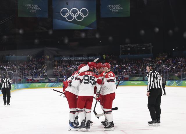 (260217) -- MILAN, Feb. 17, 2026 (Xinhua) -- Players of Denmark celebrate during the ice hockey men's qualification play-off match between the Czech Republic and Denmark at the Milan-Cortina 2026 Olympic Winter Games in Milan, Italy, Feb. 17, 2026. (Xinhua/Wang Kaiyan)