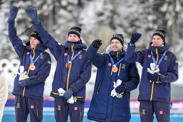 (260217) -- ANTERSELVA, Feb. 17, 2026 (Xinhua) -- Bronze medalists Sebastian Samuelsson, Martin Ponsiluoma, Jesper Nelin and Viktor Brandt of Sweden celebrate during the awarding ceremony of the biathlon men's 4x7.5km relay at the 2026 Milan-Cortina Winter Olympics in Anterselva, Italy, Feb. 17, 2026. (Xinhua/Jiang Han)