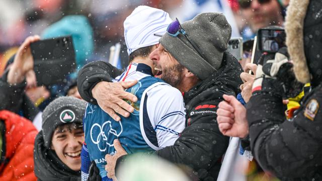 (260217) -- ANTERSELVA, Feb. 17, 2026 (Xinhua) -- Eric Perrot of France celebrates with spectators after the biathlon men's 4x7.5km relay at the 2026 Milan-Cortina Winter Olympics in Anterselva, Italy, Feb. 17, 2026. (Xinhua/Jiang Han)