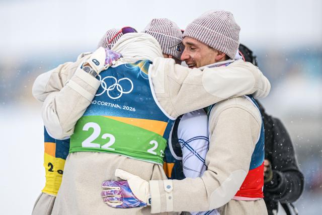 (260217) -- ANTERSELVA, Feb. 17, 2026 (Xinhua) -- Athletes of France celebrate after the biathlon men's 4x7.5km relay at the 2026 Milan-Cortina Winter Olympics in Anterselva, Italy, Feb. 17, 2026. (Xinhua/Jiang Han)