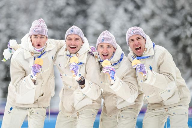 (260217) -- ANTERSELVA, Feb. 17, 2026 (Xinhua) -- Gold medalists Eric Perrot, Quentin Fillon Maillet, Emilien Jacquelin and Fabien Claude of France celebrate during the awarding ceremony of the biathlon men's 4x7.5km relay at the 2026 Milan-Cortina Winter Olympics in Anterselva, Italy, Feb. 17, 2026. (Xinhua/Jiang Han)