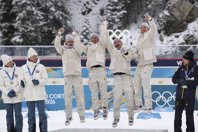 (260217) -- ANTERSELVA, Feb. 17, 2026 (Xinhua) -- Gold medalists Eric Perrot, Quentin Fillon Maillet, Emilien Jacquelin and Fabien Claude of France celebrate during the awarding ceremony of the biathlon men's 4x7.5km relay at the 2026 Milan-Cortina Winter Olympics in Anterselva, Italy, Feb. 17, 2026. (Xinhua/Zhang Tao)