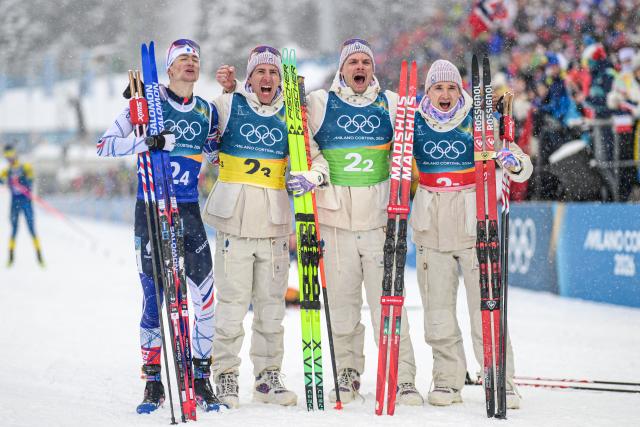 (260217) -- ANTERSELVA, Feb. 17, 2026 (Xinhua) -- Eric Perrot, Quentin Fillon Maillet, Emilien Jacquelin and Fabien Claude (L to R) of France celebrate after the biathlon men's 4x7.5km relay at the 2026 Milan-Cortina Winter Olympics in Anterselva, Italy, Feb. 17, 2026. (Xinhua/Jiang Han)