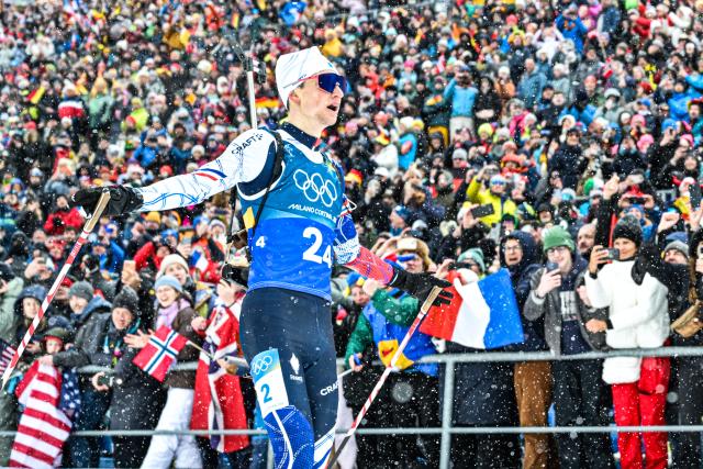 (260217) -- ANTERSELVA, Feb. 17, 2026 (Xinhua) -- Eric Perrot of France crosses the finish line during the biathlon men's 4x7.5km relay at the 2026 Milan-Cortina Winter Olympics in Anterselva, Italy, Feb. 17, 2026. (Xinhua/Jiang Han)