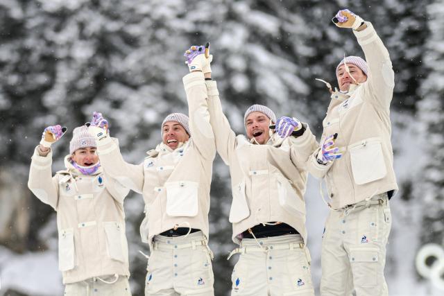 (260217) -- ANTERSELVA, Feb. 17, 2026 (Xinhua) -- Gold medalists Eric Perrot, Quentin Fillon Maillet, Emilien Jacquelin and Fabien Claude of France celebrate during the awarding ceremony of the biathlon men's 4x7.5km relay at the 2026 Milan-Cortina Winter Olympics in Anterselva, Italy, Feb. 17, 2026. (Xinhua/Jiang Han)