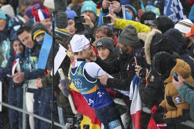 (260217) -- ANTERSELVA, Feb. 17, 2026 (Xinhua) -- Eric Perrot of France celebrates after the biathlon men's 4x7.5km relay at the 2026 Milan-Cortina Winter Olympics in Anterselva, Italy, Feb. 17, 2026. (Xinhua/Zhang Tao)