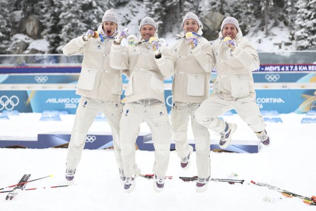 (260217) -- ANTERSELVA, Feb. 17, 2026 (Xinhua) -- Gold medalists Eric Perrot, Quentin Fillon Maillet, Emilien Jacquelin and Fabien Claude of France celebrate during the awarding ceremony of the biathlon men's 4x7.5km relay at the 2026 Milan-Cortina Winter Olympics in Anterselva, Italy, Feb. 17, 2026. (Xinhua/Zhang Tao)