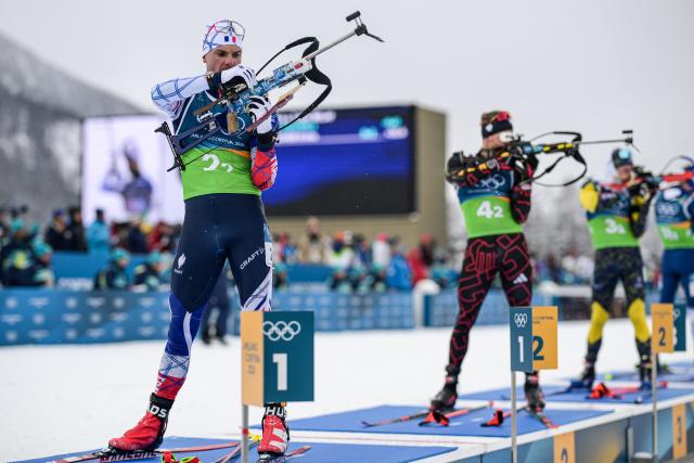 (260217) -- ANTERSELVA, Feb. 17, 2026 (Xinhua) -- Emilien Jacquelin (L) of France competes during the biathlon men's 4x7.5km relay at the 2026 Milan-Cortina Winter Olympics in Anterselva, Italy, Feb. 17, 2026. (Xinhua/Jiang Han)