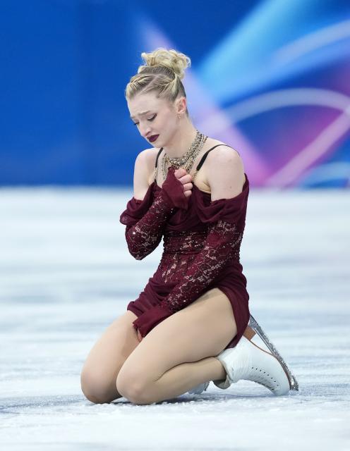 (260217) -- MILAN, Feb. 17, 2026 (Xinhua) -- Amber Glenn of the United States reacts after the short program match of figure skating women single skating at the Milan-Cortina 2026 Olympic Winter Games in Milan, Italy, Feb. 17, 2026. (Xinhua/Xue Yuge)