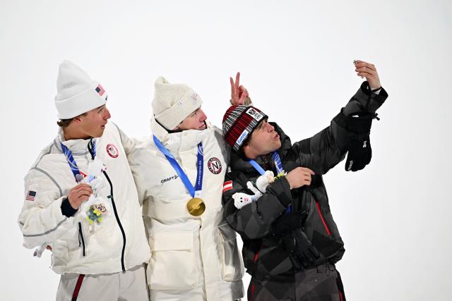 (260218) -- LIVIGNO, Feb. 18, 2026 (Xinhua) -- Gold medalist Tormod Frostad (C) of Norway, silver medalist Mac Forehand (L) of the United States and bronze medalist Matej Svancer of Austria take a selfie on the podium during the victory ceremony for Freestyle Skiing Men's Freeski Big Air at the Milan-Cortina 2026 Olympic Winter Games in Livigno, Italy, Feb. 17, 2026. (Xinhua/Zhang Hongxiang)