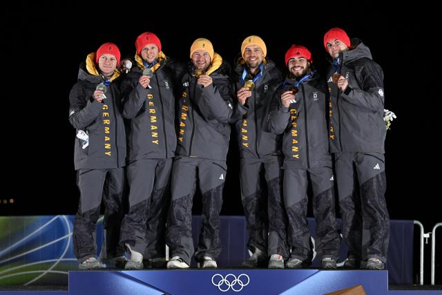 (260218) -- CORTINA D'AMPEZZO, Feb. 18, 2026 (Xinhua) -- Gold medalists Johannes Lochner (3rd L)/Georg Fleischhauer (3rd R), silver medalists Francesco Friedrich (1st L)/Alexander Schuller (2nd L) and bronze medalists Adam Ammour (2nd R)/Alexander Schaller of Germany pose during the awarding ceremony for the Bobsleigh 2-man at the Milan-Cortina 2026 Olympic Winter Games in Cortina D'Ampezzo, Italy, Feb. 17, 2026. (Xinhua/Lian Yi)