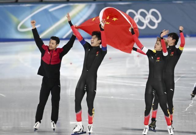 (260218) -- BEIJING, Feb. 18, 2026 (Xinhua) -- Liu Hanbin, Wu Yu, Li Wenhao and Ning Zhongyan of China celebrate after the speed skating men's team pursuit final B between China and the Netherlands at the Milan-Cortina 2026 Olympic Winter Games in Milan, Italy, Feb. 17, 2026. (Xinhua/Wu Wei)
