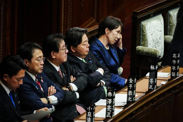 (260218) -- TOKYO, Feb. 18, 2026 (Xinhua) -- Sanae Takaichi (1st R) attends Japan's prime ministerial designation vote in the House of Representatives in Tokyo, Japan, Feb. 18, 2026. Sanae Takaichi, president of Japan's ruling Liberal Democratic Party, was elected as the country's 105th prime minister on Wednesday by lawmakers in parliament. (Xinhua/Jia Haocheng)