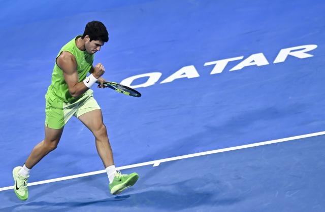 (260218) -- DOHA, Feb. 18, 2026 (Xinhua) -- Carlos Alcaraz of Spain reacts during the men's singles round of 32 match against Arthur Rinderknech of France at the ATP Qatar Open 2026 tennis tournament in Doha, Qatar, on Feb. 17, 2026. (Photo by Nikku/Xinhua)