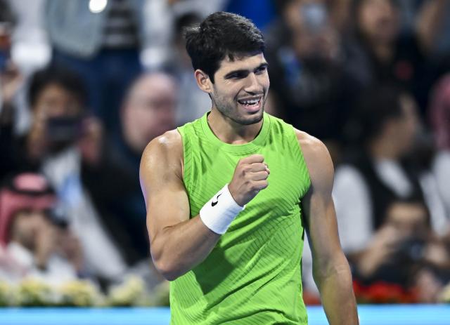 (260218) -- DOHA, Feb. 18, 2026 (Xinhua) -- Carlos Alcaraz of Spain celebrates during the men's singles round of 32 match against Arthur Rinderknech of France at the ATP Qatar Open 2026 tennis tournament in Doha, Qatar, on Feb. 17, 2026. (Photo by Nikku/Xinhua)