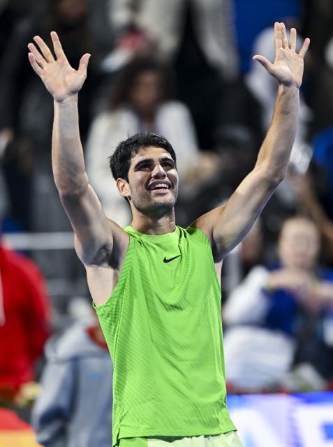 (260218) -- DOHA, Feb. 18, 2026 (Xinhua) -- Carlos Alcaraz of Spain celebrates after winning the men's singles round of 32 match against Arthur Rinderknech of France at the ATP Qatar Open 2026 tennis tournament in Doha, Qatar, on Feb. 17, 2026. (Photo by Nikku/Xinhua)