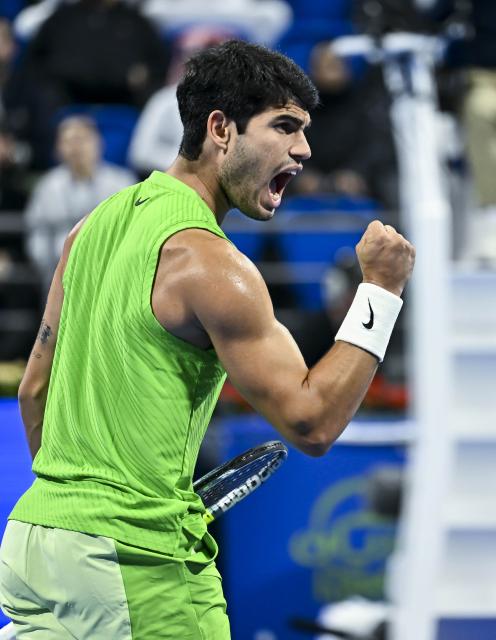 (260218) -- DOHA, Feb. 18, 2026 (Xinhua) -- Carlos Alcaraz of Spain celebrates during the men's singles round of 32 match against Arthur Rinderknech of France at the ATP Qatar Open 2026 tennis tournament in Doha, Qatar, on Feb. 17, 2026. (Photo by Nikku/Xinhua)