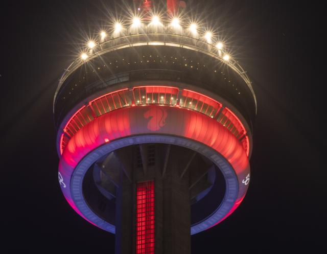 (260218) -- TORONTO, Feb. 18, 2026 (Xinhua) -- The Canadian National Tower (CN Tower) is lit in red to celebrate the Chinese New Year in Toronto, Canada, Feb. 17, 2026. (Photo by Zou Zheng/Xinhua)
