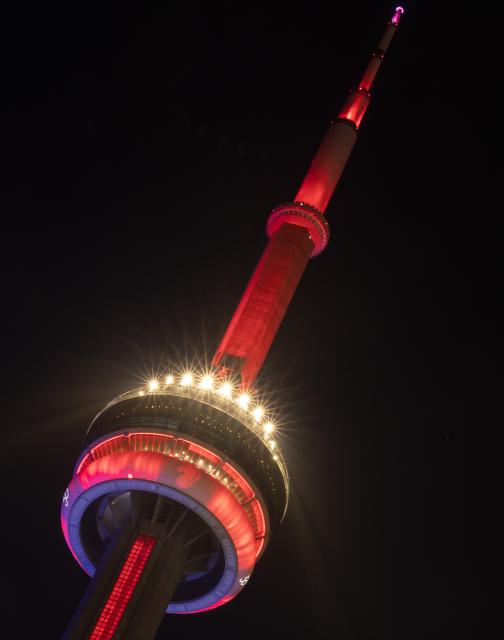 (260218) -- TORONTO, Feb. 18, 2026 (Xinhua) -- The Canadian National Tower (CN Tower) is lit in red to celebrate the Chinese New Year in Toronto, Canada, Feb. 17, 2026. (Photo by Zou Zheng/Xinhua)