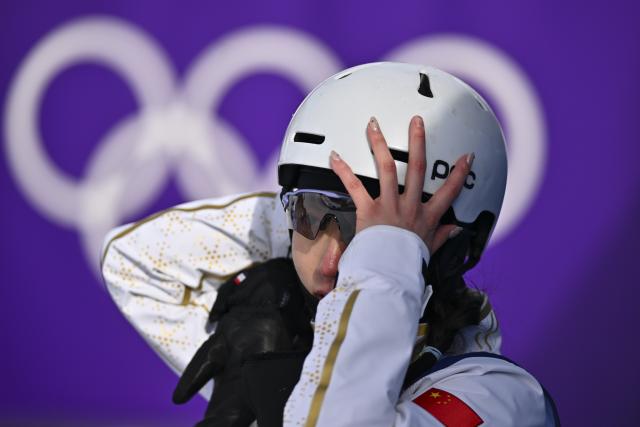 (260218) -- LIVIGNO, Feb. 18, 2026 (Xinhua) -- Shao Qi of China reacts during the freestyle skiing women's aerials qualification 1 at the Milan-Cortina 2026 Olympic Winter Games in Livigno, Italy, Feb. 18, 2026. (Xinhua/Zhang Hongxiang)