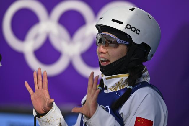 (260218) -- LIVIGNO, Feb. 18, 2026 (Xinhua) -- Shao Qi of China reacts during the freestyle skiing women's aerials qualification 1 at the Milan-Cortina 2026 Olympic Winter Games in Livigno, Italy, Feb. 18, 2026. (Xinhua/Zhang Hongxiang)