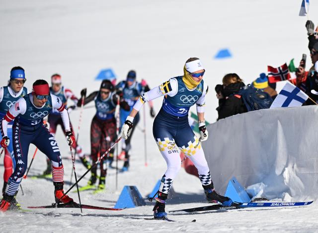 (260218) -- TESERO, Feb. 18, 2026 (Xinhua) -- Maja Dahlqvist (1st R) of Sweden competes during the cross-country skiing women's team sprint free final at the Milan-Cortina 2026 Olympic Winter Games in Tesero, Italy, Feb. 18, 2026. (Xinhua/He Canling)