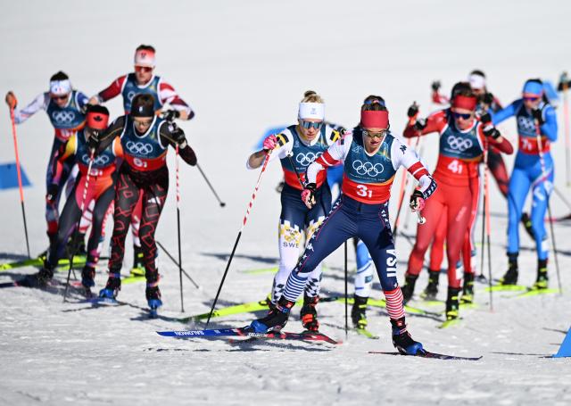(260218) -- TESERO, Feb. 18, 2026 (Xinhua) -- Athletes compete during the cross-country skiing women's team sprint free final at the Milan-Cortina 2026 Olympic Winter Games in Tesero, Italy, Feb. 18, 2026. (Xinhua/He Canling)