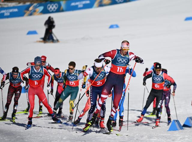 (260218) -- TESERO, Feb. 18, 2026 (Xinhua) -- Athletes compete during the cross-country skiing men's team sprint free final at the Milan-Cortina 2026 Olympic Winter Games in Tesero, Italy, Feb. 18, 2026. (Xinhua/He Canling)