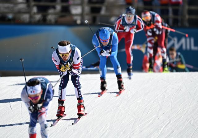 (260218) -- TESERO, Feb. 18, 2026 (Xinhua) -- Athletes compete during the cross-country skiing men's team sprint free final at the Milan-Cortina 2026 Olympic Winter Games in Tesero, Italy, Feb. 18, 2026. (Xinhua/He Canling)