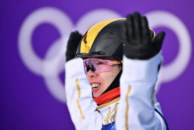 (260218) -- LIVIGNO, Feb. 18, 2026 (Xinhua) -- Kong Fanyu of China reacts during the freestyle skiing women's aerials final 1 at the Milan-Cortina 2026 Olympic Winter Games in Livigno, Italy, Feb. 18, 2026. (Xinhua/Zhang Hongxiang)