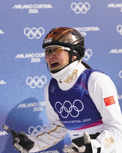 (260218) -- LIVIGNO, Feb. 18, 2026 (Xinhua) -- Xu Mengtao of China reacts after the freestyle skiing women's aerials final 2 at the Milan-Cortina 2026 Olympic Winter Games in Livigno, Italy, Feb. 18, 2026. (Xinhua/Wu Huiwo)