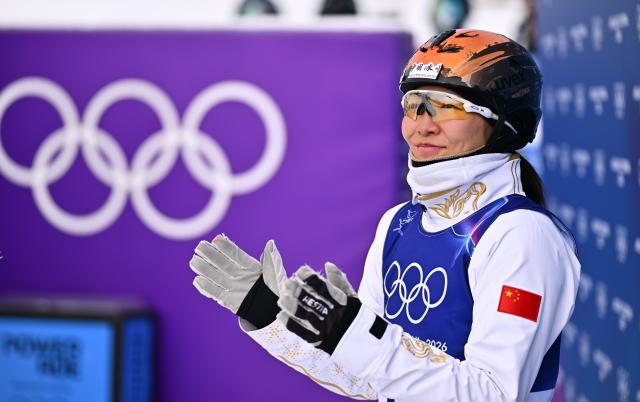 (260218) -- LIVIGNO, Feb. 18, 2026 (Xinhua) -- Xu Mengtao of China reacts during the freestyle skiing women's aerials final 1 at the Milan-Cortina 2026 Olympic Winter Games in Livigno, Italy, Feb. 18, 2026. (Xinhua/Zhang Hongxiang)