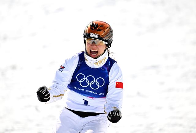 (260218) -- LIVIGNO, Feb. 18, 2026 (Xinhua) -- Xu Mengtao of China reacts after the freestyle skiing women's aerials final 2 at the Milan-Cortina 2026 Olympic Winter Games in Livigno, Italy, Feb. 18, 2026. (Xinhua/Zhang Hongxiang)