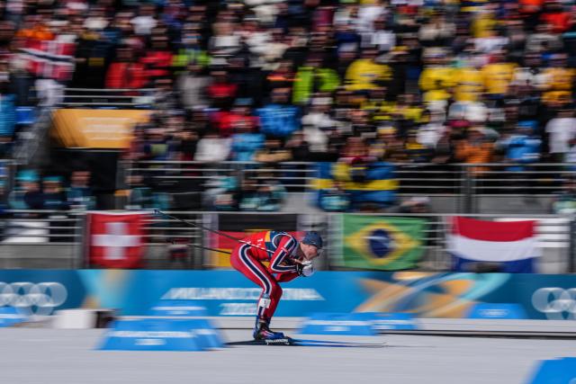 (260218) -- TESERO, Feb. 18, 2026 (Xinhua) -- Einar Hedegart of Norway competes during the cross-country skiing men's team sprint free final at the Milan-Cortina 2026 Olympic Winter Games in Tesero, Italy, Feb. 18, 2026. (Xinhua/Peng Ziyang)