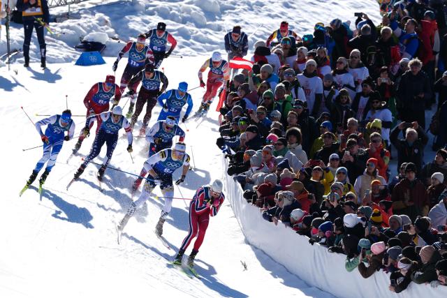 (260218) -- TESERO, Feb. 18, 2026 (Xinhua) -- Athletes compete during the cross-country skiing men's team sprint free final at the Milan-Cortina 2026 Olympic Winter Games in Tesero, Italy, Feb. 18, 2026. (Xinhua/Peng Ziyang)