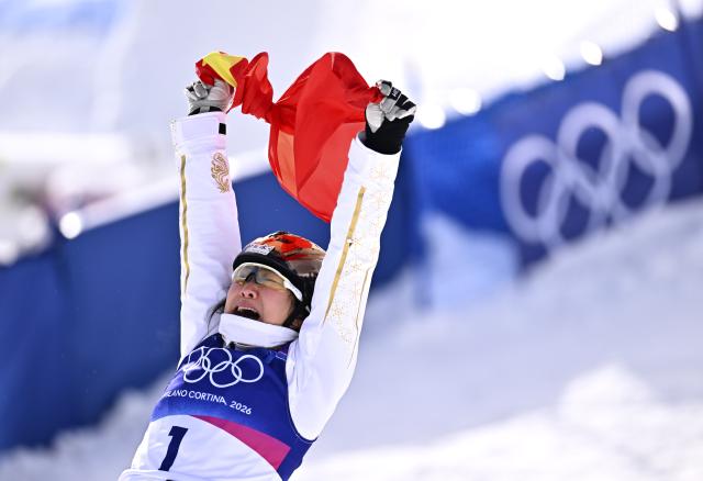 (260218) -- LIVIGNO, Feb. 18, 2026 (Xinhua) -- Xu Mengtao of China celebrates after the freestyle skiing women's aerials final 2 at the Milan-Cortina 2026 Olympic Winter Games in Livigno, Italy, Feb. 18, 2026. (Xinhua/Zhang Hongxiang)