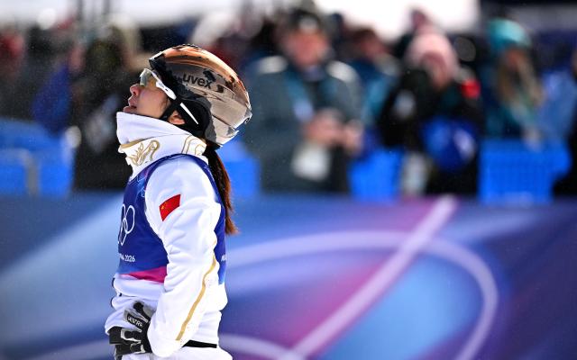 (260218) -- LIVIGNO, Feb. 18, 2026 (Xinhua) -- Xu Mengtao of China reacts after the freestyle skiing women's aerials final 2 at the Milan-Cortina 2026 Olympic Winter Games in Livigno, Italy, Feb. 18, 2026. (Xinhua/Zhang Hongxiang)
