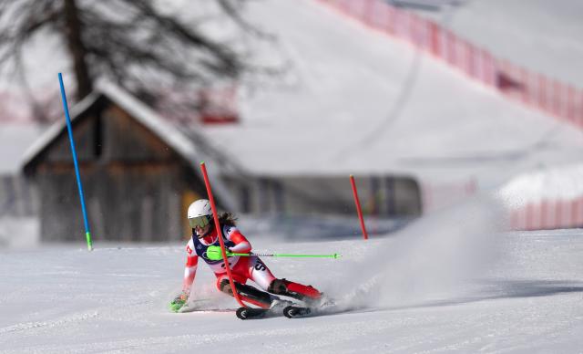 (260218) -- CORTINA D'AMPEZZO, Feb. 18, 2026 (Xinhua) -- Camille Rast of Switzerland competes during the alpine skiing women's slalom run 1 at the Milan-Cortina 2026 Olympic Winter Games in Cortina, Italy, Feb. 18, 2026. (Xinhua/Fei Maohua)