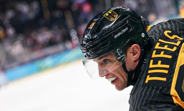 (260218) -- MILAN, Feb. 18, 2026 (Xinhua) -- Frederik Tiffels of Germany reacts during the ice hockey men's play-offs quarterfinal between the Slovakia and Germany at the Milan-Cortina 2026 Olympic Winter Games in Milan, Italy, Feb. 18, 2026. (Xinhua/Wang Kaiyan)