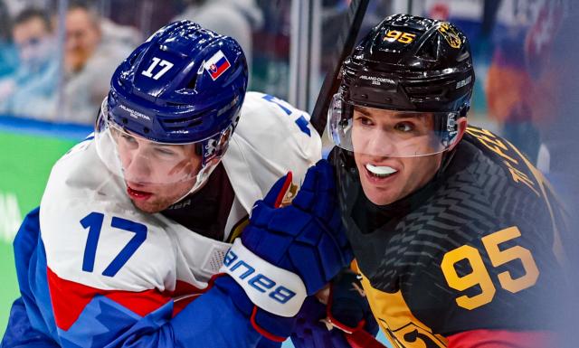 (260218) -- MILAN, Feb. 18, 2026 (Xinhua) -- Frederik Tiffels (R) of Germany vies with Simon Nemec of Slovakia during the ice hockey men's play-offs quarterfinal between the Slovakia and Germany at the Milan-Cortina 2026 Olympic Winter Games in Milan, Italy, Feb. 18, 2026. (Xinhua/Wang Kaiyan)