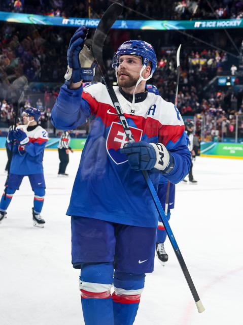 (260218) -- MILAN, Feb. 18, 2026 (Xinhua) -- Erik Cernak of Slovakia greets the spectators after the ice hockey men's play-offs quarterfinal between the Slovakia and Germany at the Milan-Cortina 2026 Olympic Winter Games in Milan, Italy, Feb. 18, 2026. (Xinhua/Wang Kaiyan)