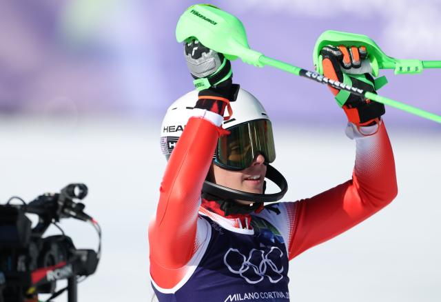 (260218) -- CORTINA D'AMPEZZO, Feb. 18, 2026 (Xinhua) -- Camille Rast of Switzerland celebrates after the alpine skiing women's slalom run 2 at the Milan-Cortina 2026 Olympic Winter Games in Cortina, Italy, Feb. 18, 2026. (Xinhua/Zhang Chenlin)