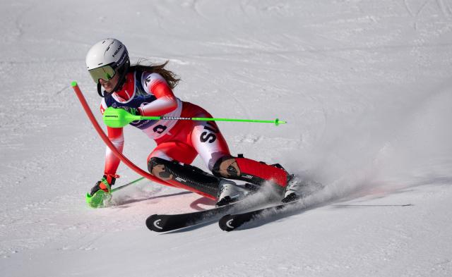 (260218) -- CORTINA D'AMPEZZO, Feb. 18, 2026 (Xinhua) -- Camille Rast of Switzerland competes during the alpine skiing women's slalom run 1 at the Milan-Cortina 2026 Olympic Winter Games in Cortina, Italy, Feb. 18, 2026. (Xinhua/Fei Maohua)