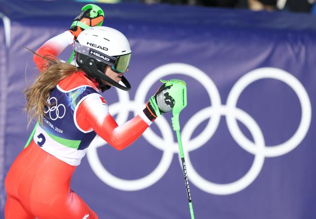 (260218) -- CORTINA D'AMPEZZO, Feb. 18, 2026 (Xinhua) -- Camille Rast of Switzerland celebrates after the alpine skiing women's slalom run 2 at the Milan-Cortina 2026 Olympic Winter Games in Cortina, Italy, Feb. 18, 2026. (Xinhua/Zhang Chenlin)