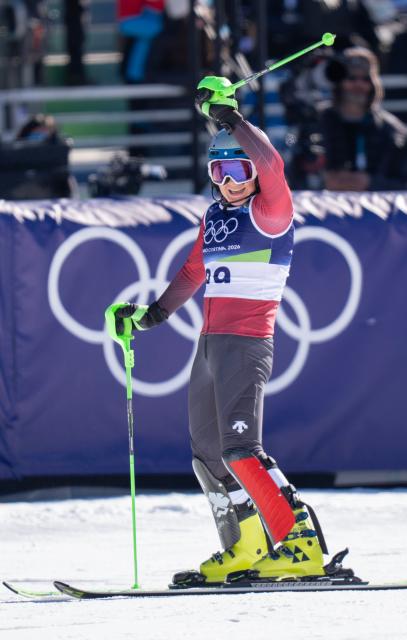 (260218) -- CORTINA D'AMPEZZO, Feb. 18, 2026 (Xinhua) -- Zhang Yuying of China reacts after the alpine skiing women's slalom run 1 at the Milan-Cortina 2026 Olympic Winter Games in Cortina, Italy, Feb. 18, 2026. (Xinhua/Fei Maohua)