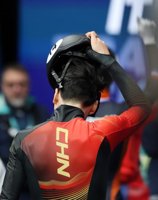 (260218) -- MILAN, Feb. 18, 2026 (Xinhua) -- Liu Shaoang of China reacts after the short track speed skating men's 500m semifinal at the Milan-Cortina 2026 Olympic Winter Games in Milan, Italy, Feb. 18, 2026. (Xinhua/Li Ming)