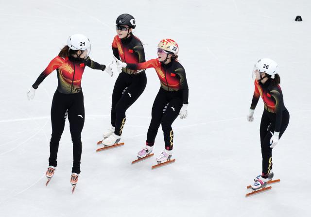 (260218) -- MILAN, Feb. 18, 2026 (Xinhua) -- Zhang Chutong, Gong Li, Yang Jingru and Wang Xinran (L to R) of China react after the short track speed skating women's 3000m relay final B at the Milan-Cortina 2026 Olympic Winter Games in Milan, Italy, Feb. 18, 2026. (Xinhua/Xue Yuge)