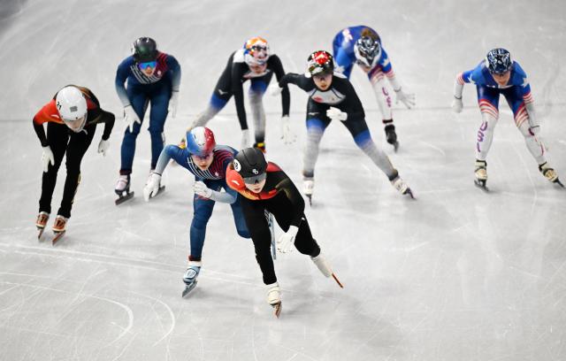 (260218) -- MILAN, Feb. 18, 2026 (Xinhua) -- Gong Li (front) of China competes during the short track speed skating women's 3000m relay final B at the Milan-Cortina 2026 Olympic Winter Games in Milan, Italy, Feb. 18, 2026. (Xinhua/Cheng Min)