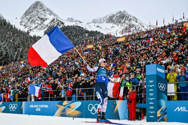 (260218) -- ANTERSELVA, Feb. 18, 2026 (Xinhua) -- Julia Simon of France crosses the finish line during the biathlon women's 4x6km relay at the 2026 Milan-Cortina Winter Olympics in Anterselva, Italy, Feb. 18, 2026. (Xinhua/Jiang Han)